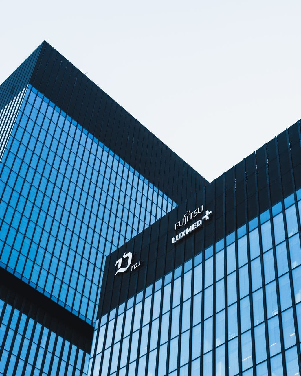 A minimalist view of sleek skyscrapers in Katowice, showcasing contemporary architectural style.