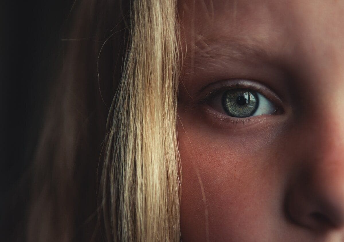 woman with blonde hair and blue eyes